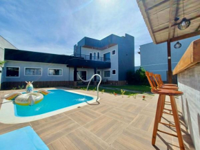 Casa Top em Rio das Ostras há poucos passos do Mar!